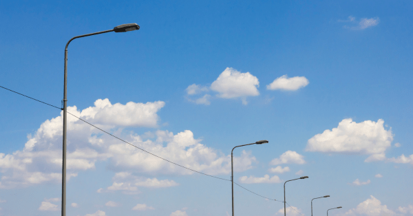 LED Street lights lined going down a road