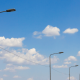 LED Street lights lined going down a road