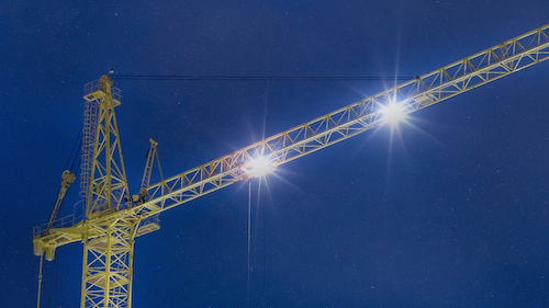 Timed dimming of crane lights